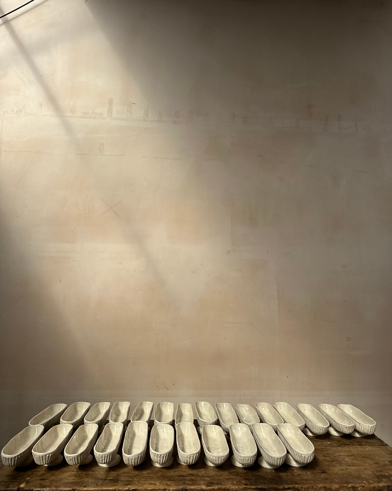 FOOTED STONEWARE MANTLE VASE