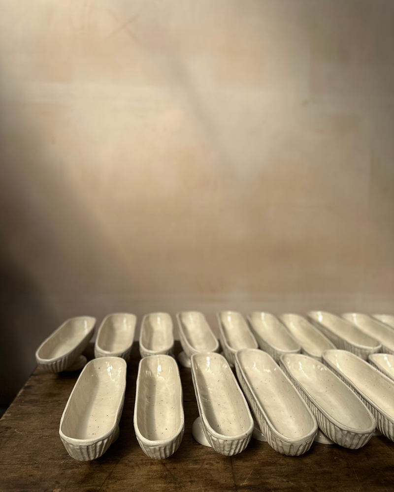 FOOTED STONEWARE MANTLE VASE