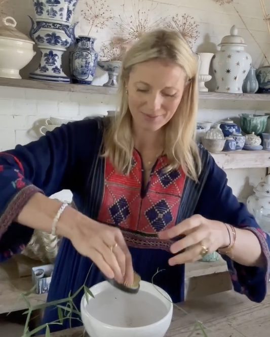 Willow Crossley using a flower frog, kenzan or floral pin holder in a bowl
